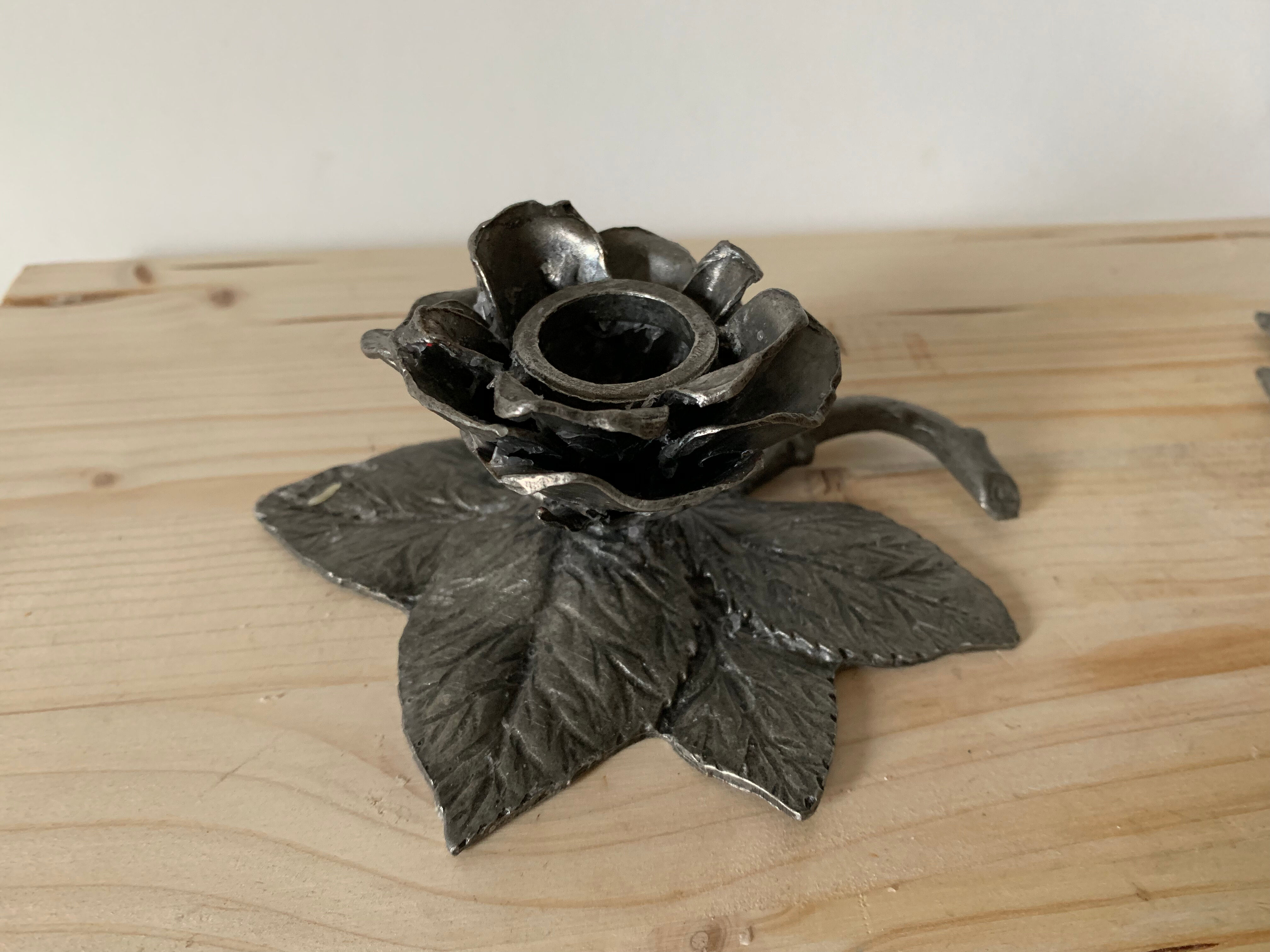 Tin flower candle holder