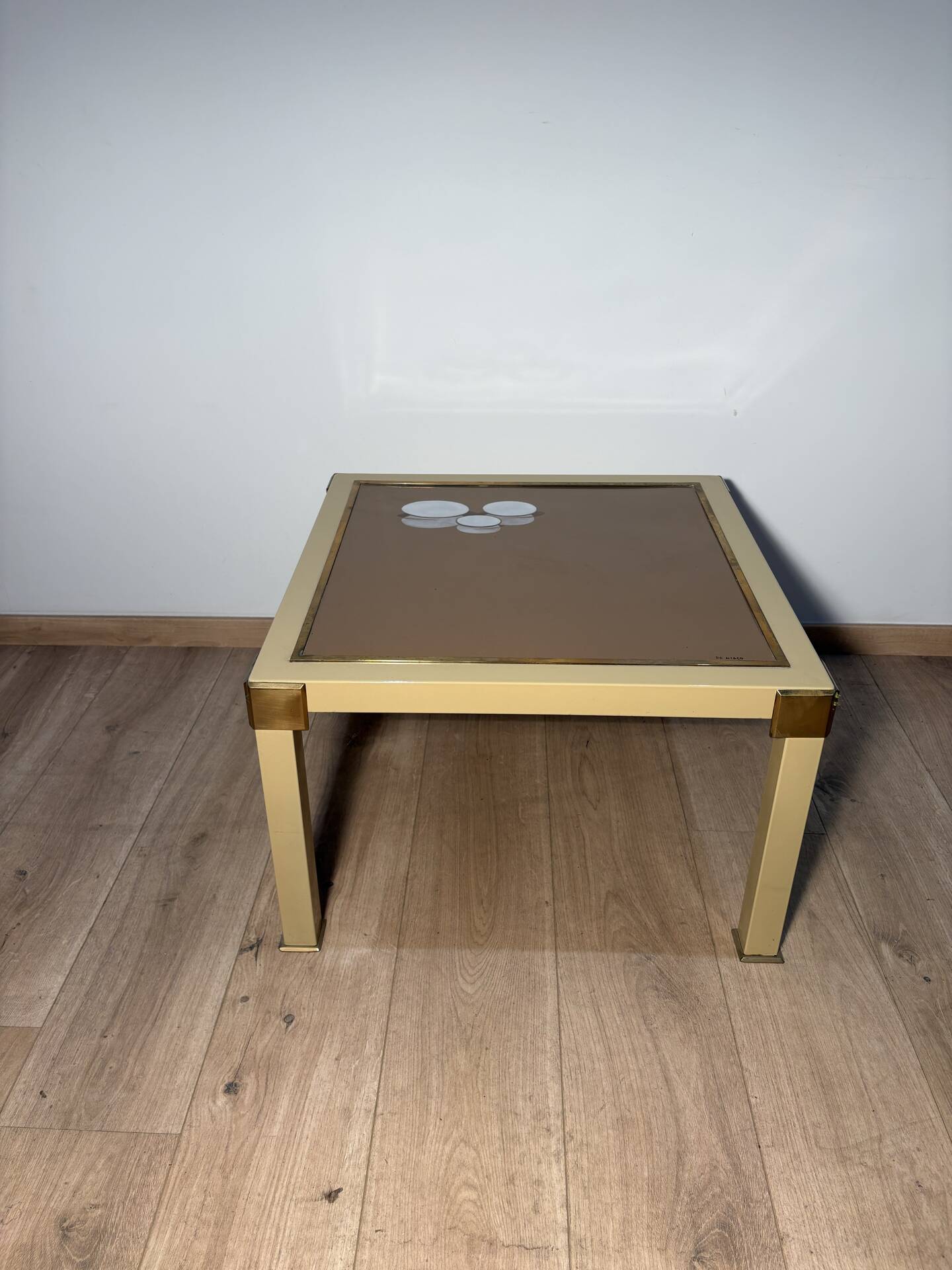 Metal and brass coffee table in ceramic by Nisco.