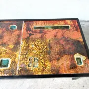 Coffee table by Robert and Jean Cloutier in enamelled lava and metal, 1950s.