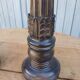 2 carved wooden candlesticks