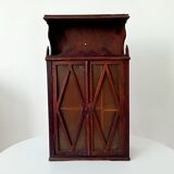 Small antique wall cabinet in Gothic style.