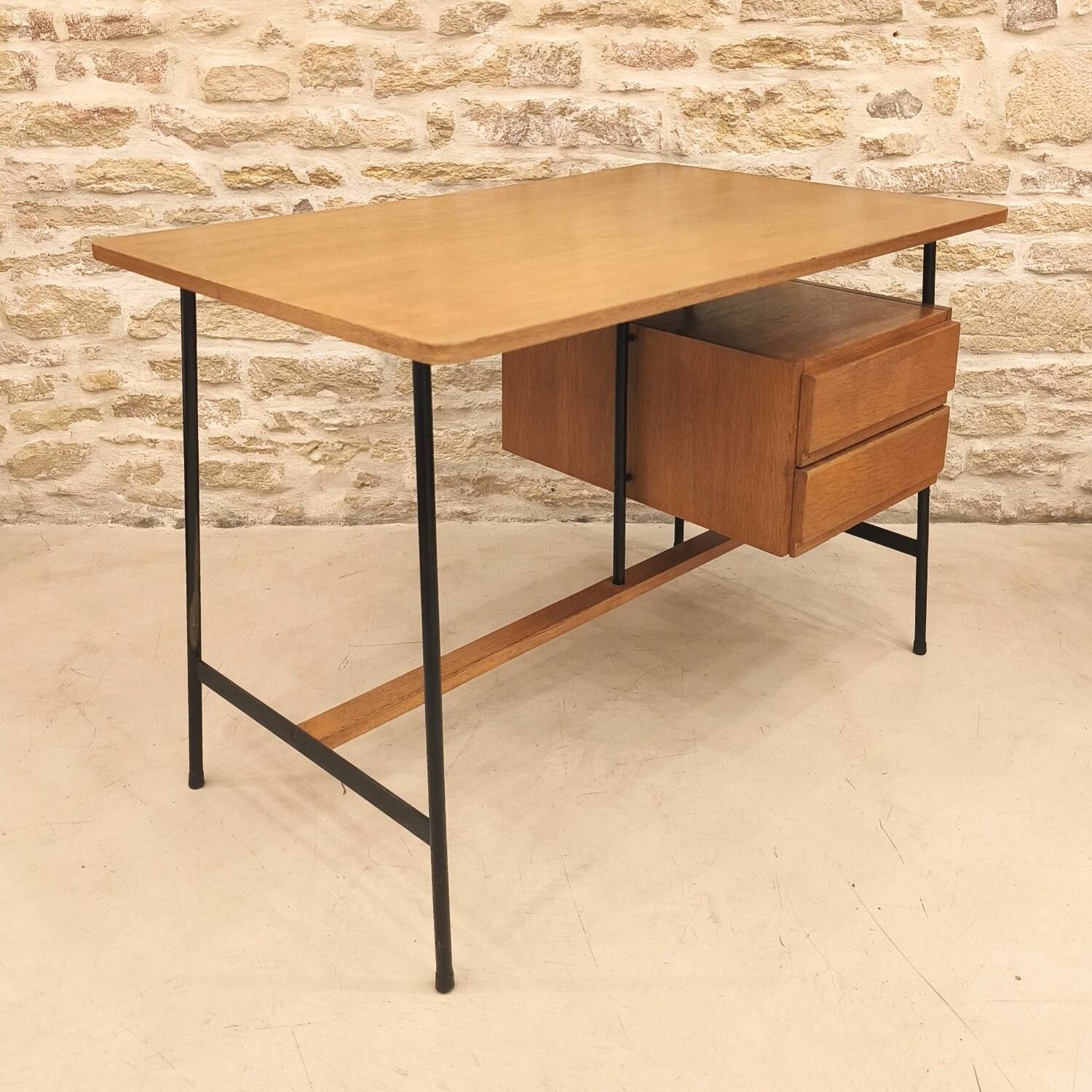 Modernist desk with suspended drawer unit, French work from the 1950s.
