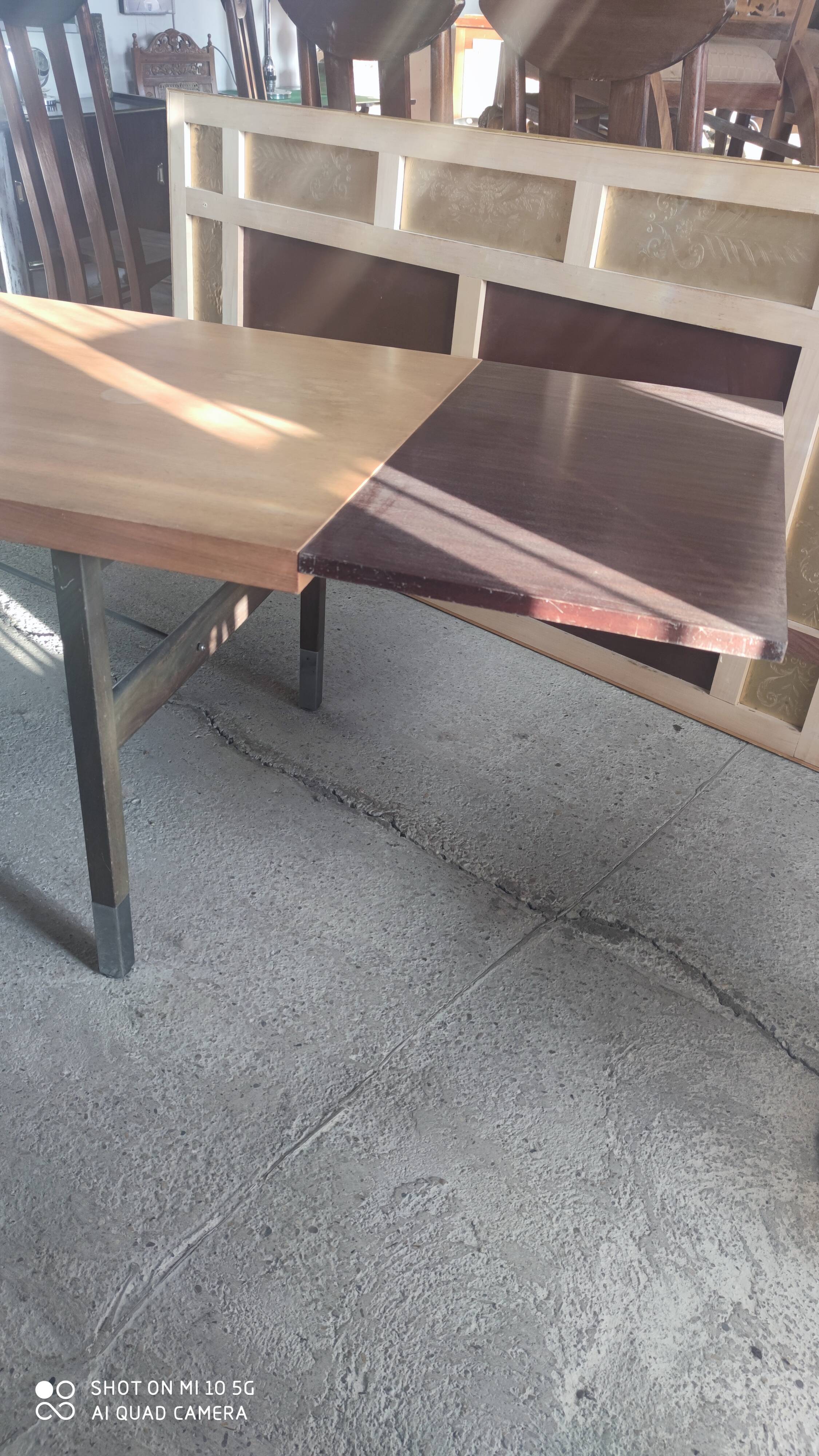 Extendable dining table in walnut, mahogany and chrome, circa 1960