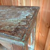 Teak shelves with a green patina