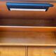 Secretary with drop-leaf in Louis XVI style, made of solid wood and brass, desk/commode.