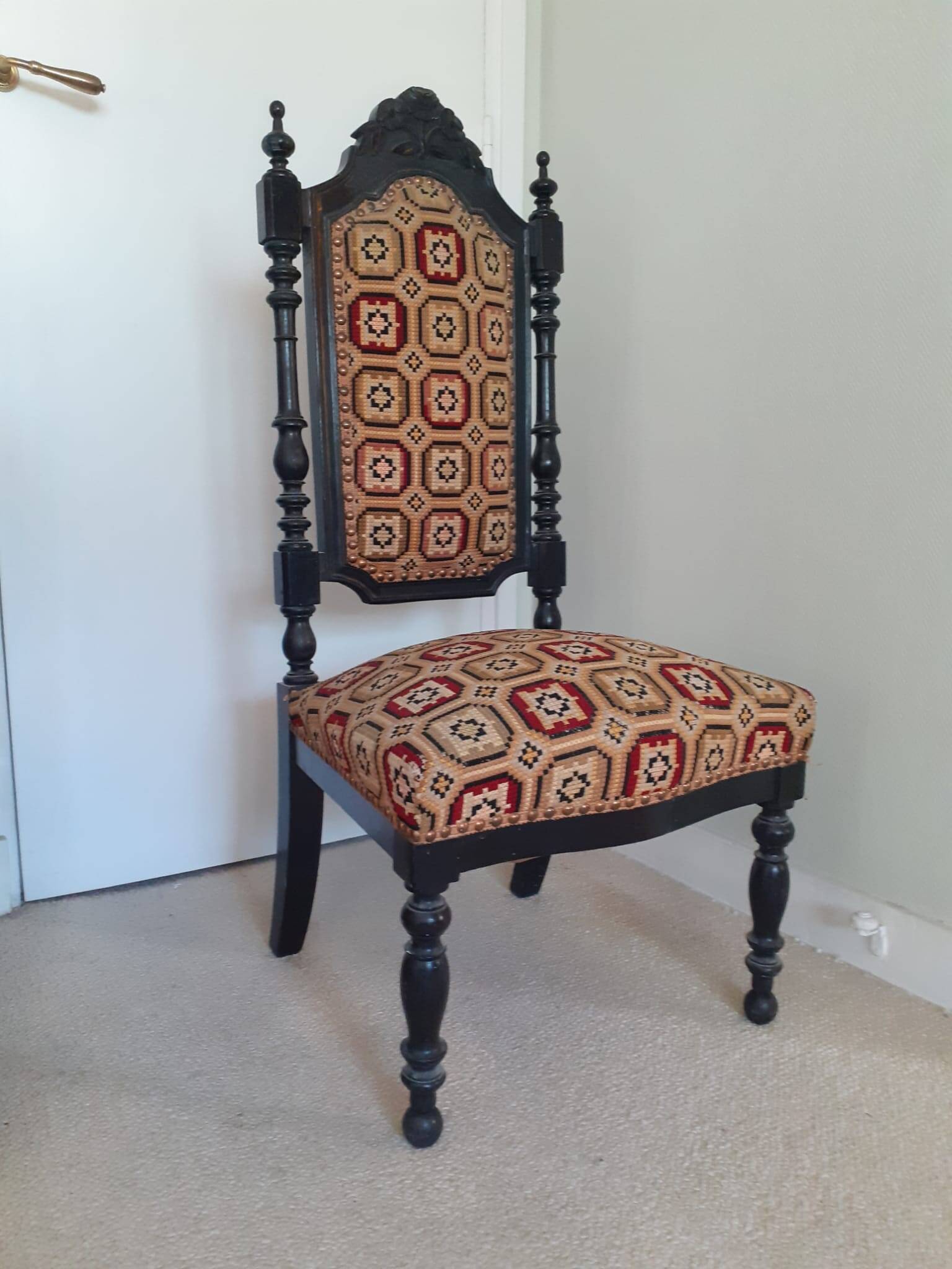Antique black wooden chair