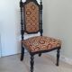 Antique black wooden chair
