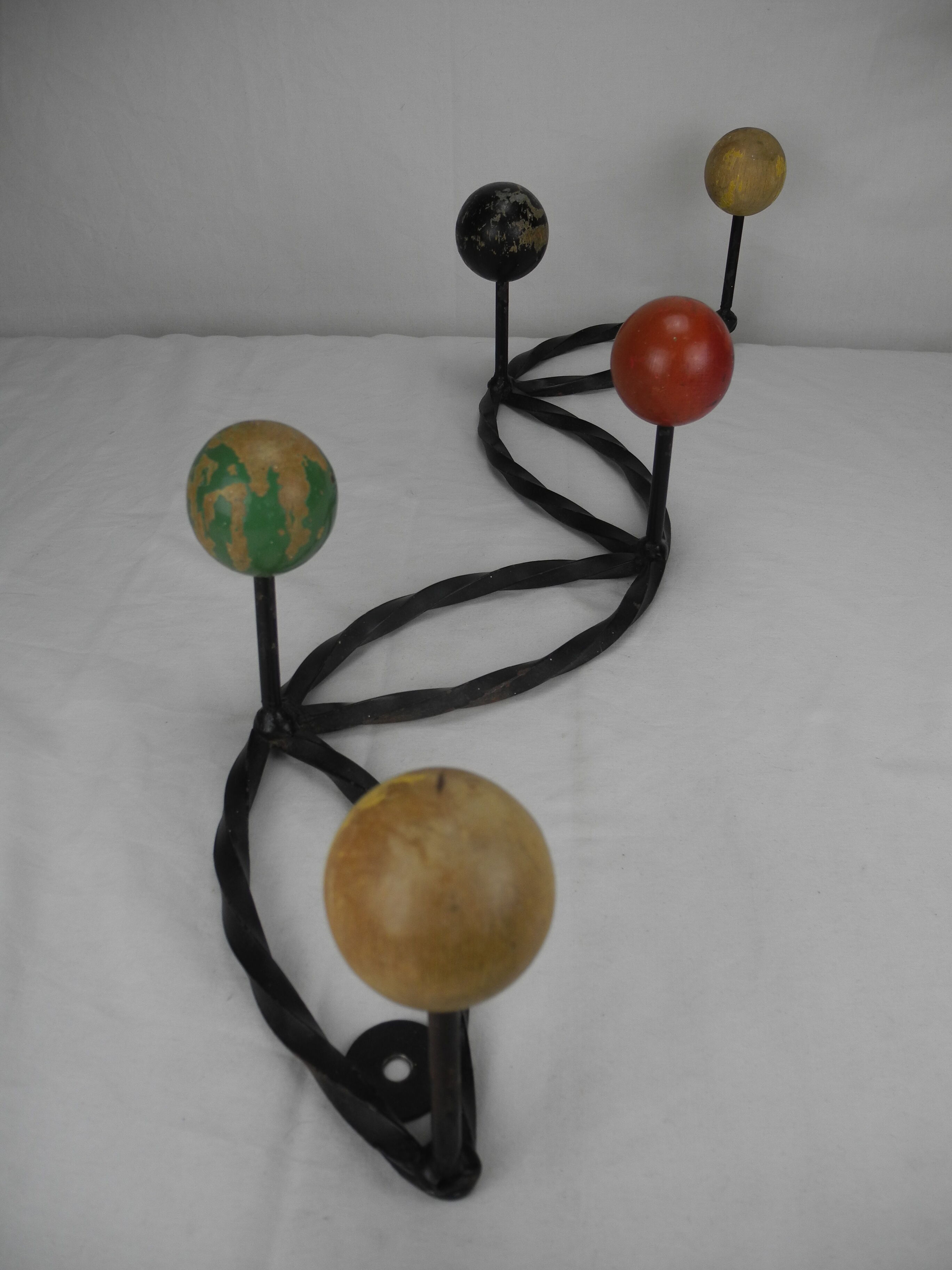 Old wrought iron coat rack