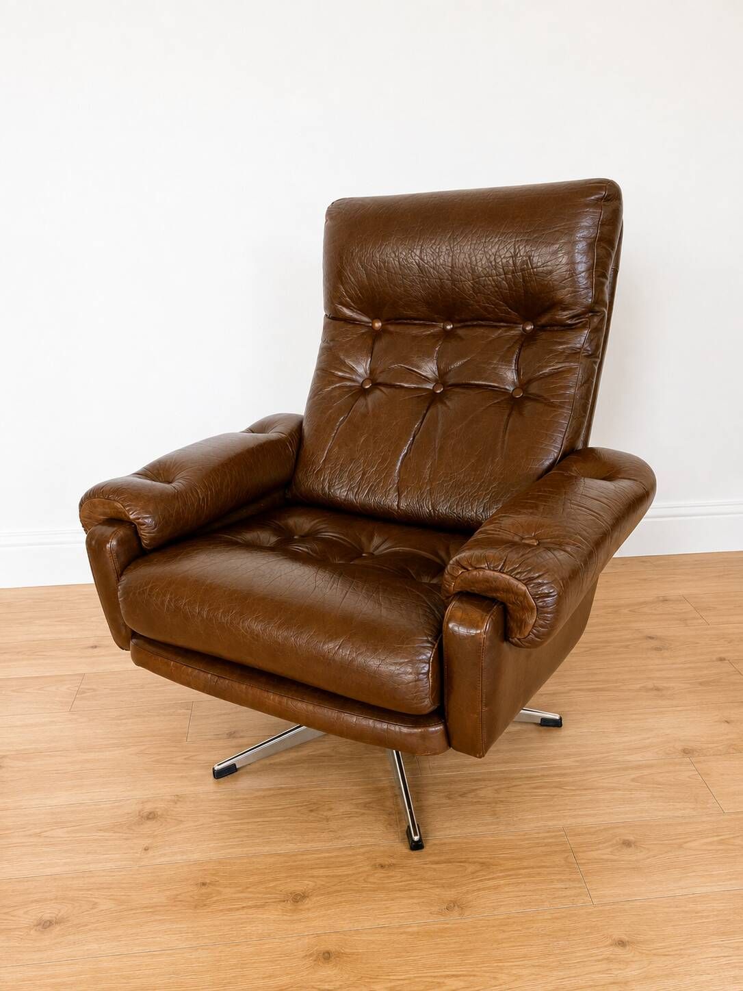 Vintage Danish mid-century brown leather swivel chair 1970s
