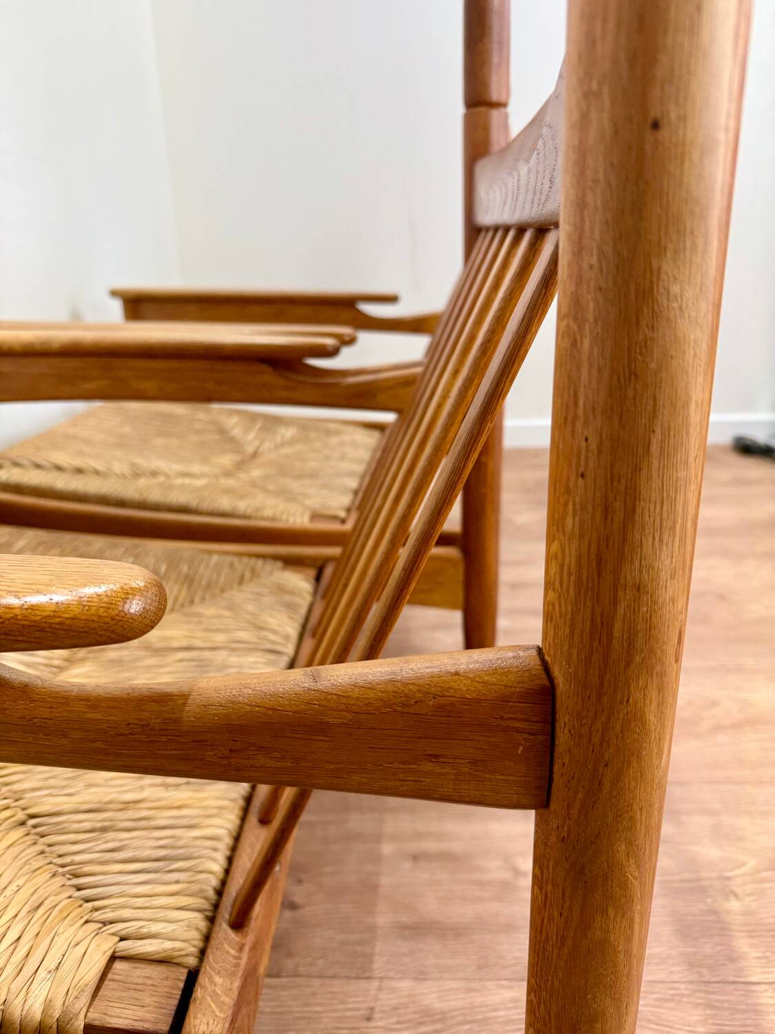Pair of wooden and straw armchairs