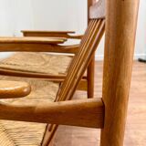 Pair of wooden and straw armchairs