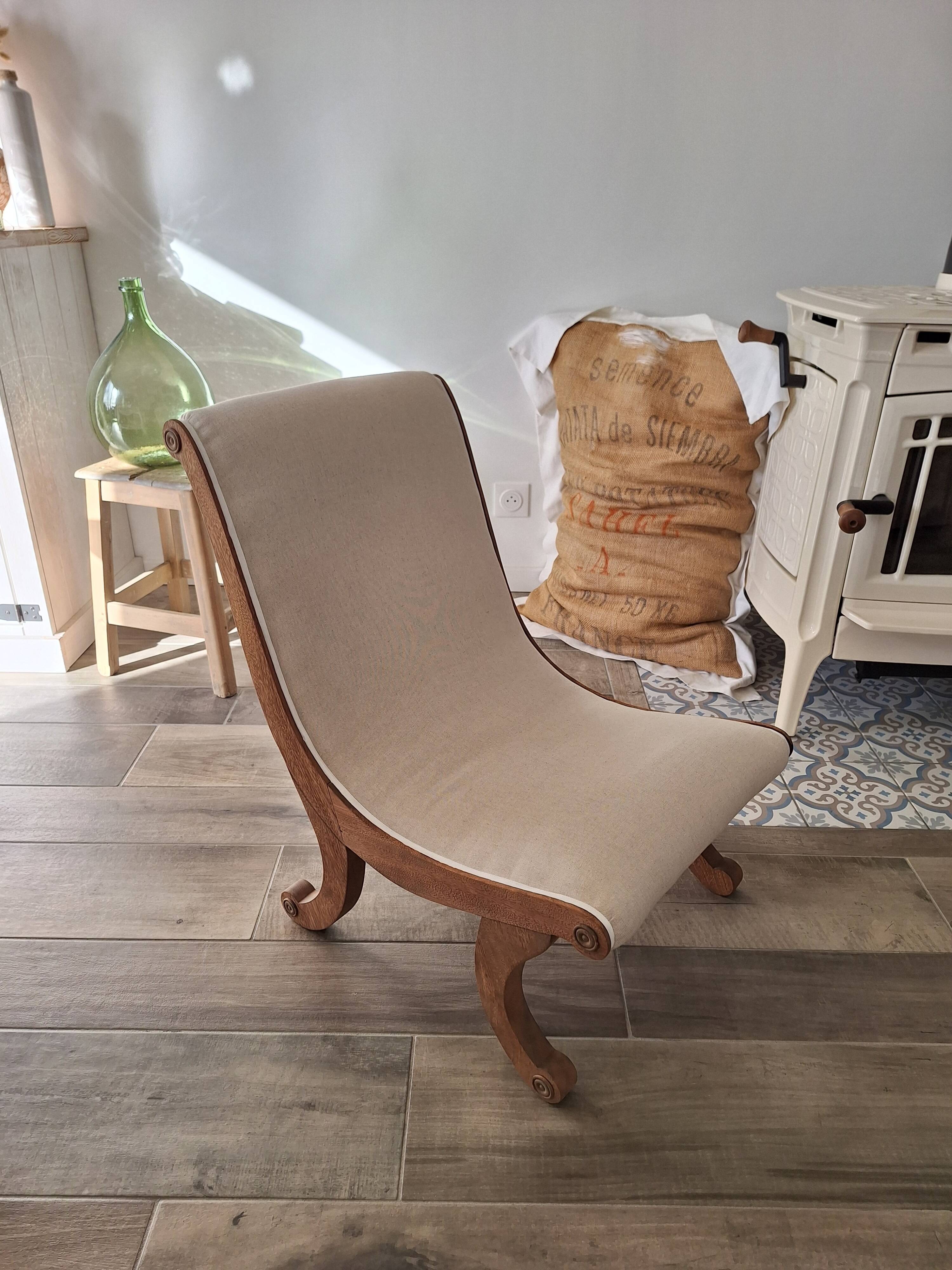Vintage gondola armchair in beige linen fabric.