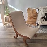 Vintage gondola armchair in beige linen fabric.