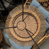 Rattan coffee table with black metal base