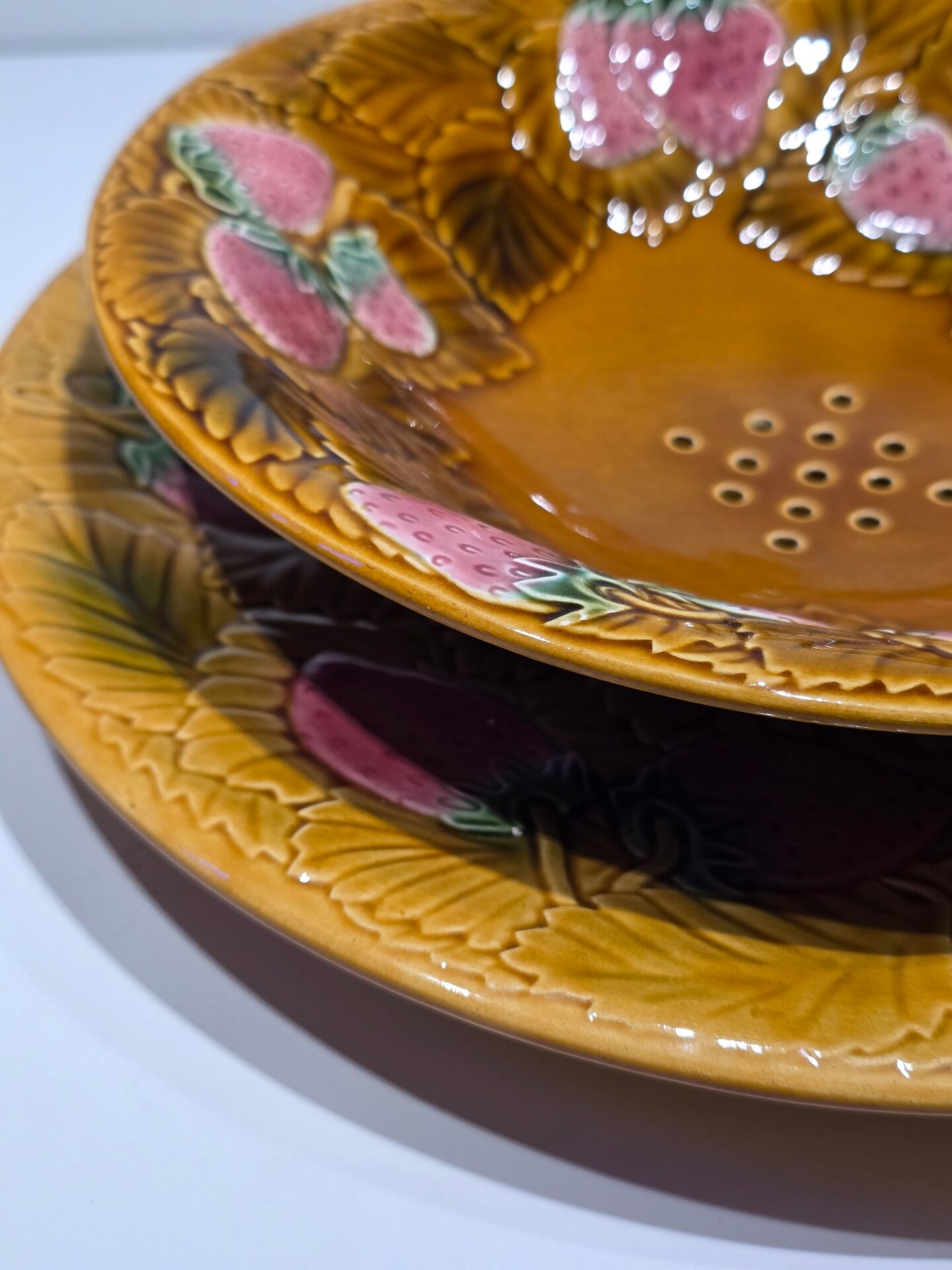 Fruit strainer in Barbotine and serving dish from Salin les Bains.