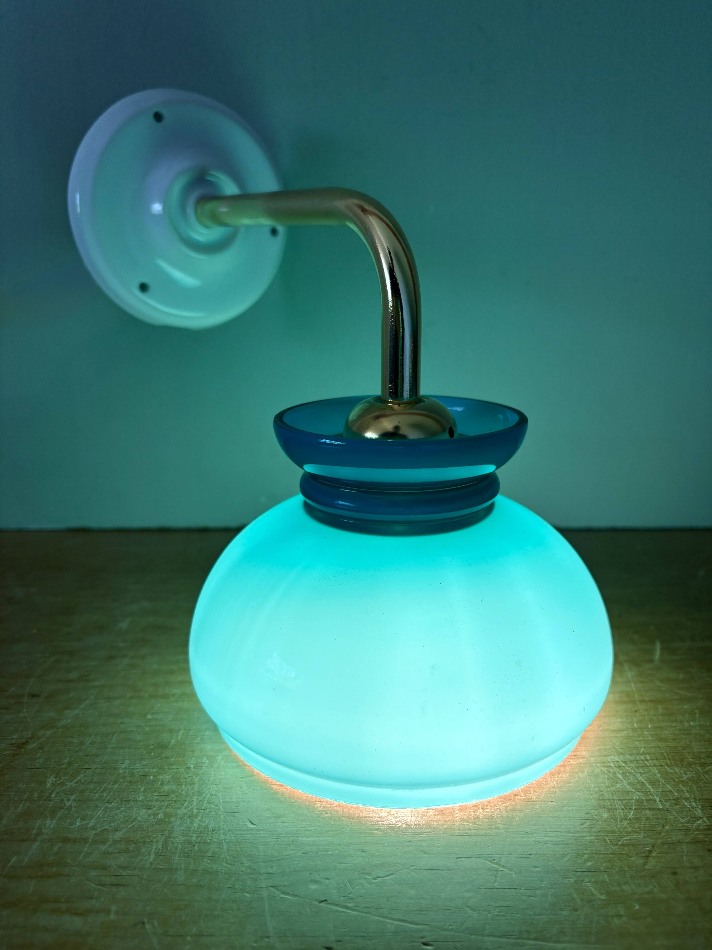 Vintage angled globe wall light in blue opaline