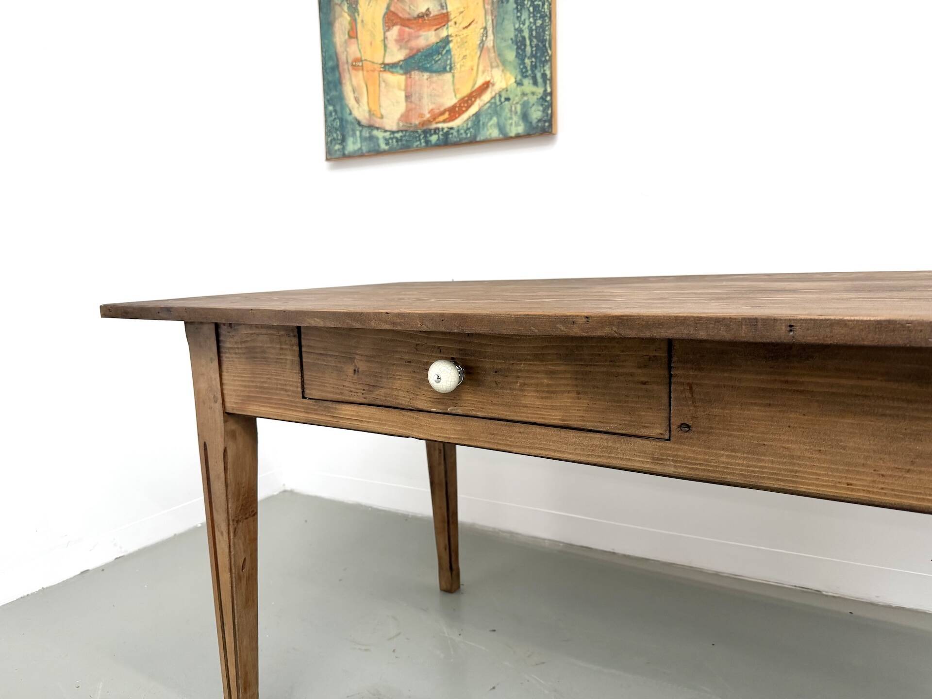 Solid pine farmhouse table, two drawers, fluted legs, France.
