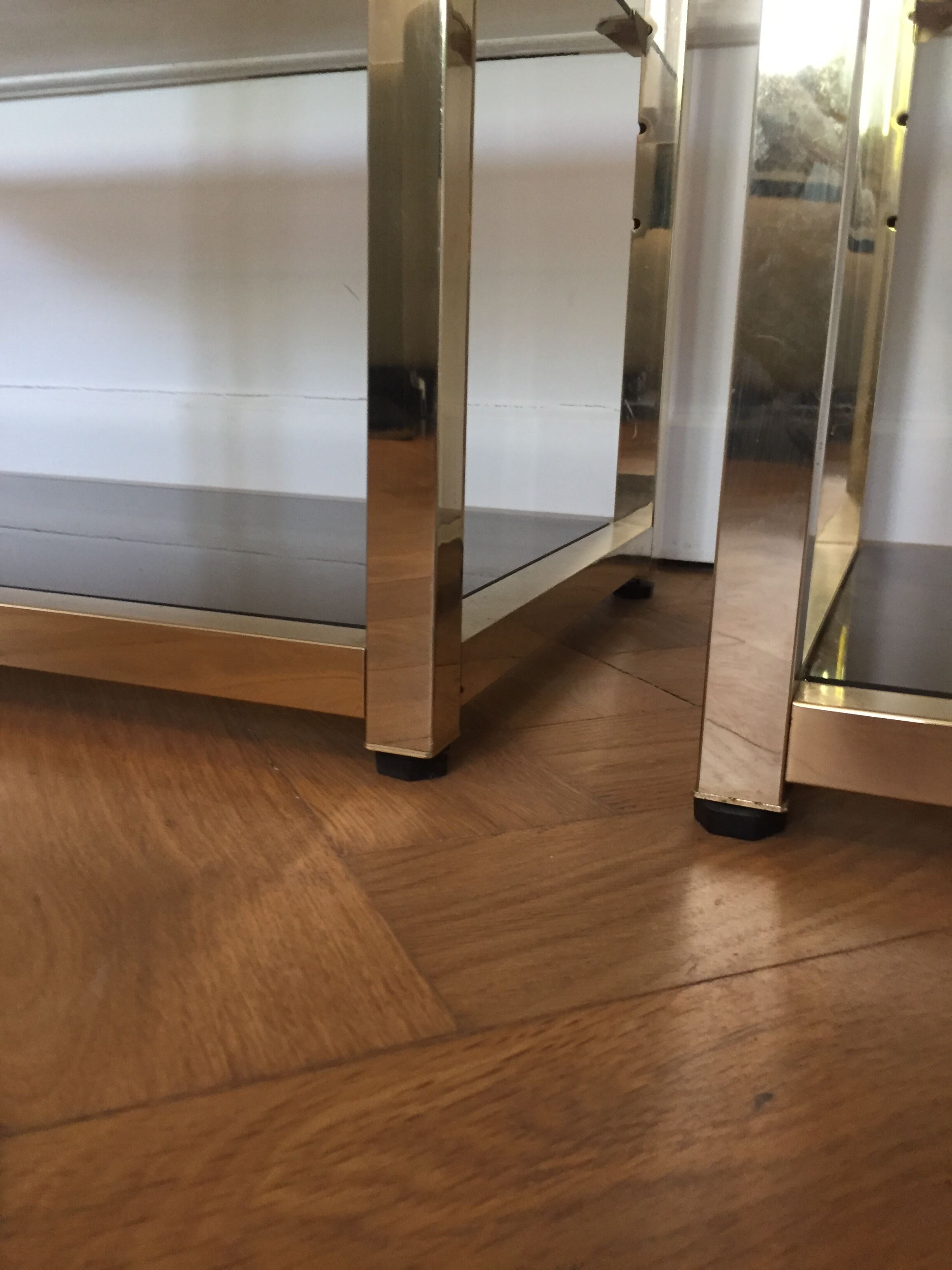 Pair of consoles brass shelves and smoked glass design Roche Bobois