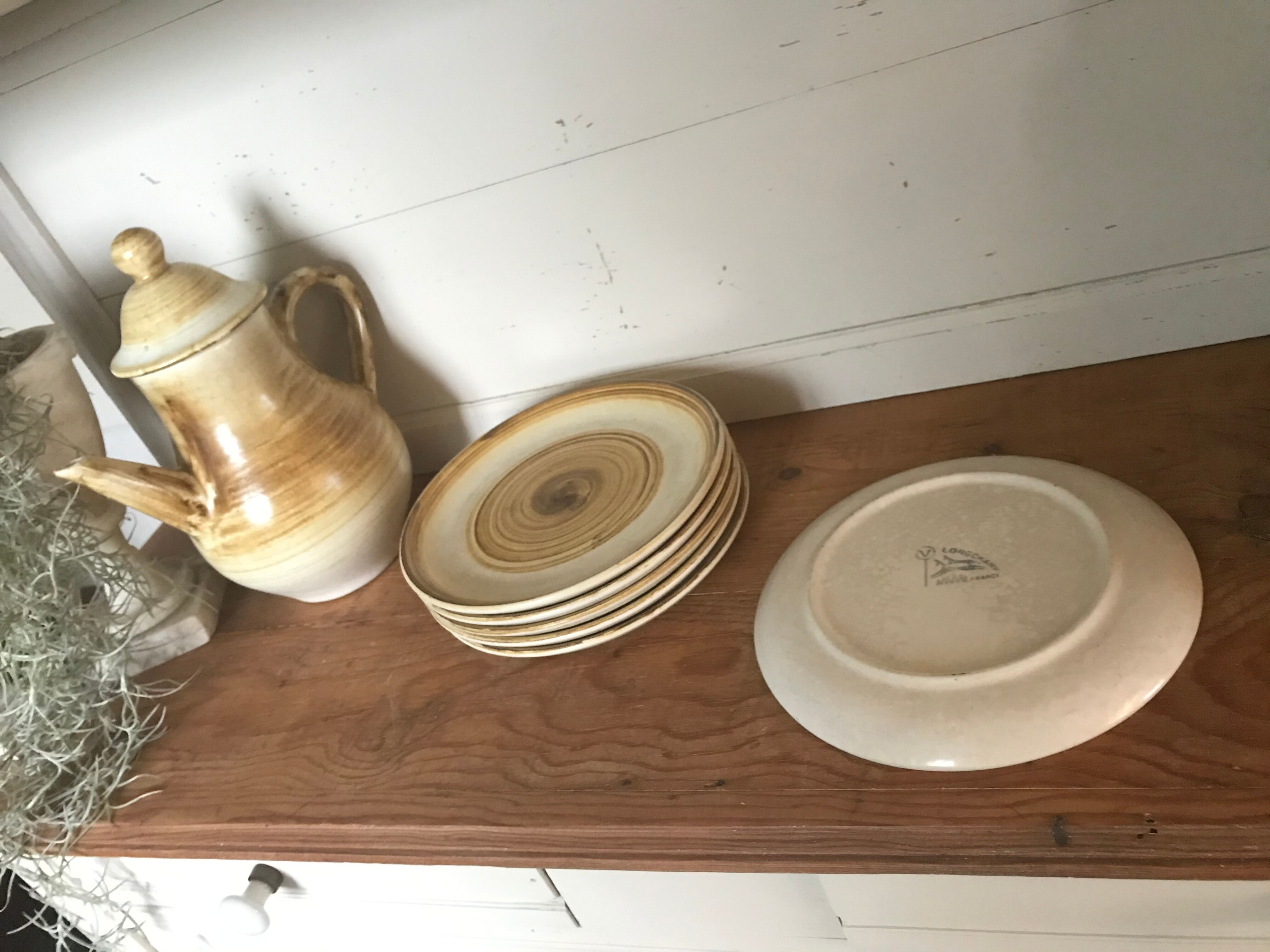 Six sandstone dessert plates by Longchamp