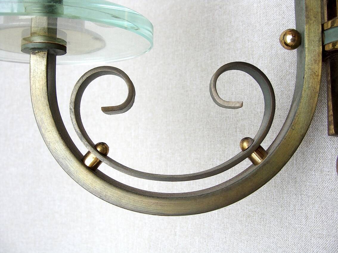 Pair of art deco lacquered metal, brass and glass wall lights