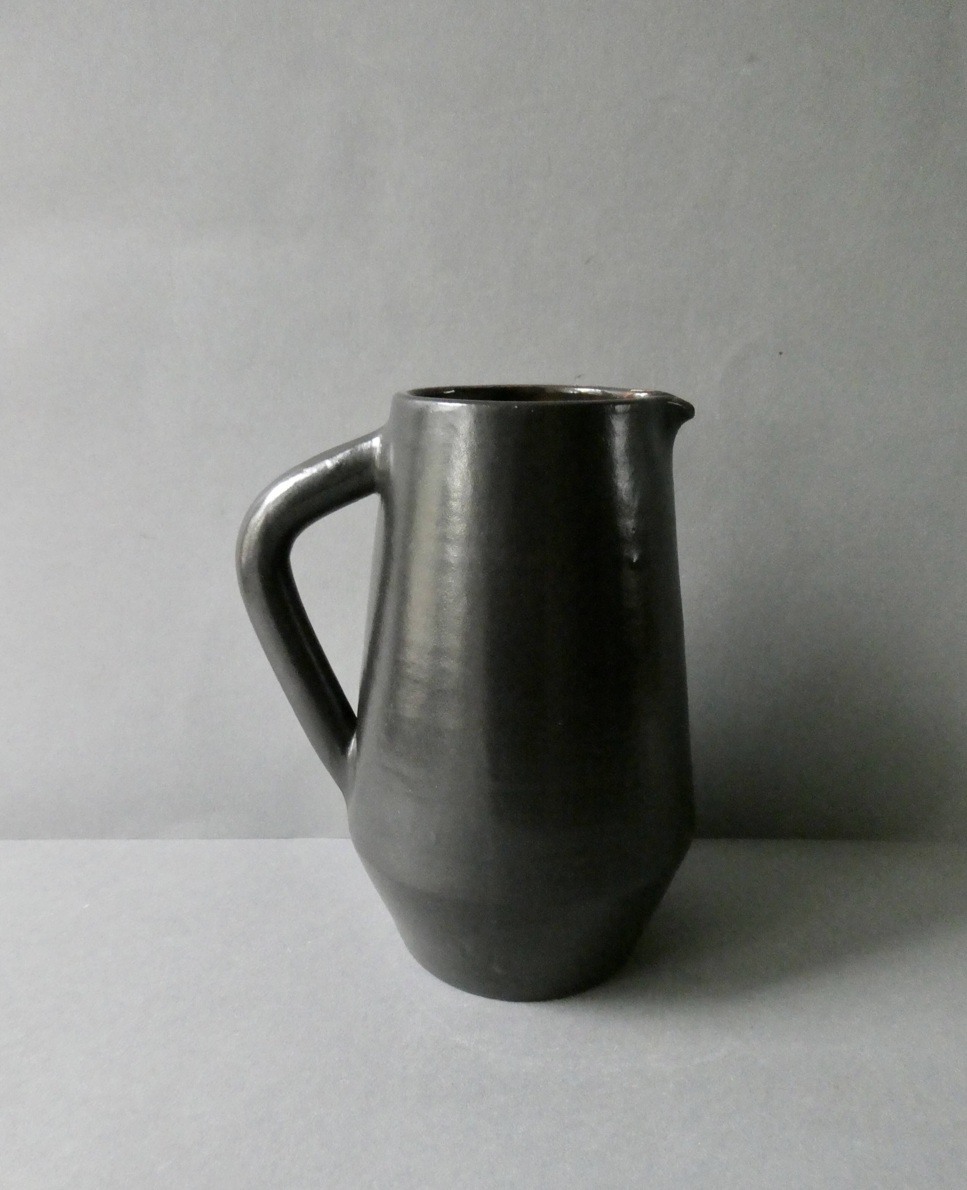 Glazed stoneware pitcher, signed Denise and Michel Pointu