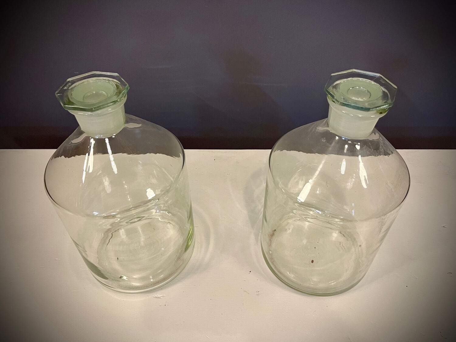 Pair of old factory perfume bottles