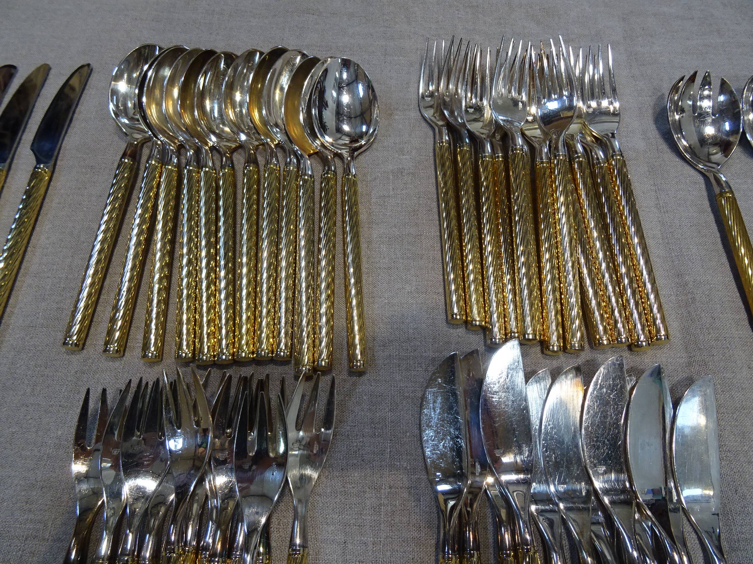 Housewife in silver and gold metal 104 cutlery