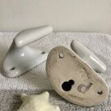 Pair of white porcelain hooks
