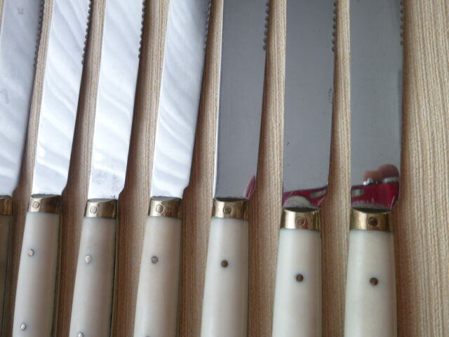 Set of 12 vintage stainless steel bakelite and brass table knives