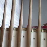 Set of 12 vintage stainless steel bakelite and brass table knives