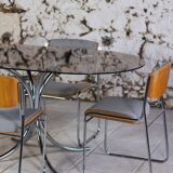 Oval dining table in chrome and smoked glass, 1970.