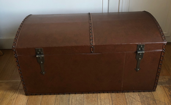 Ancient wooden and faux leather trunk