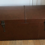Ancient wooden and faux leather trunk