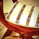 French Empire mahogany office chair with carved detail in the shape of