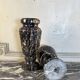 Paire de vases en marbre Portor, vers 1920