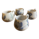 Ensemble de quatre tasses à café. Gustave Reynaud.
