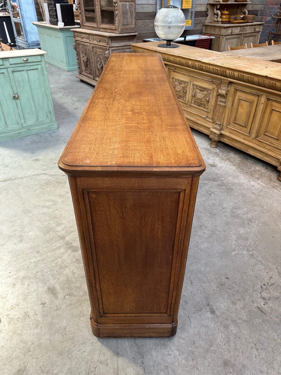 Early 20th-century oak hardware counter