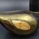 Wooden and brass swan