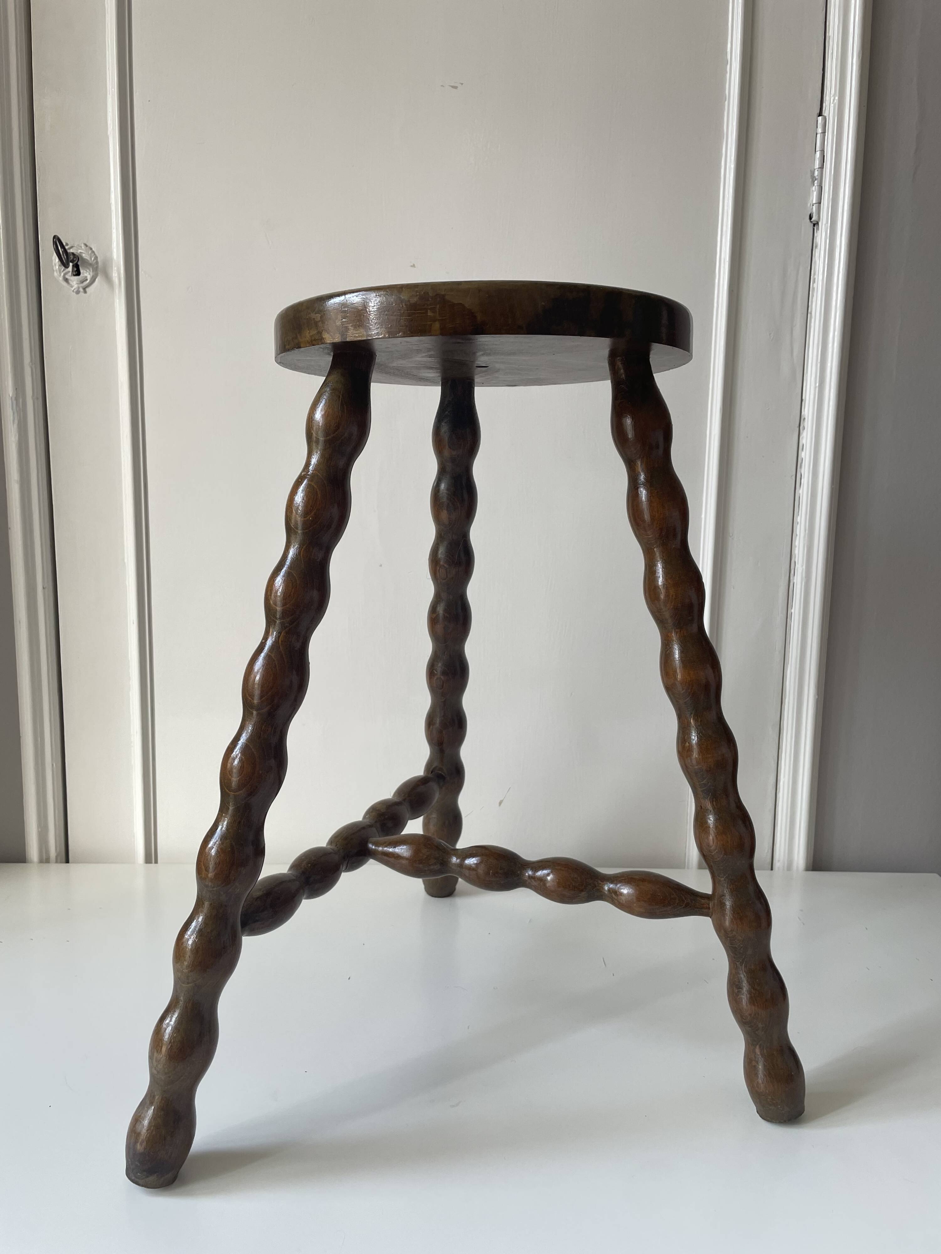 Wooden tripod stool