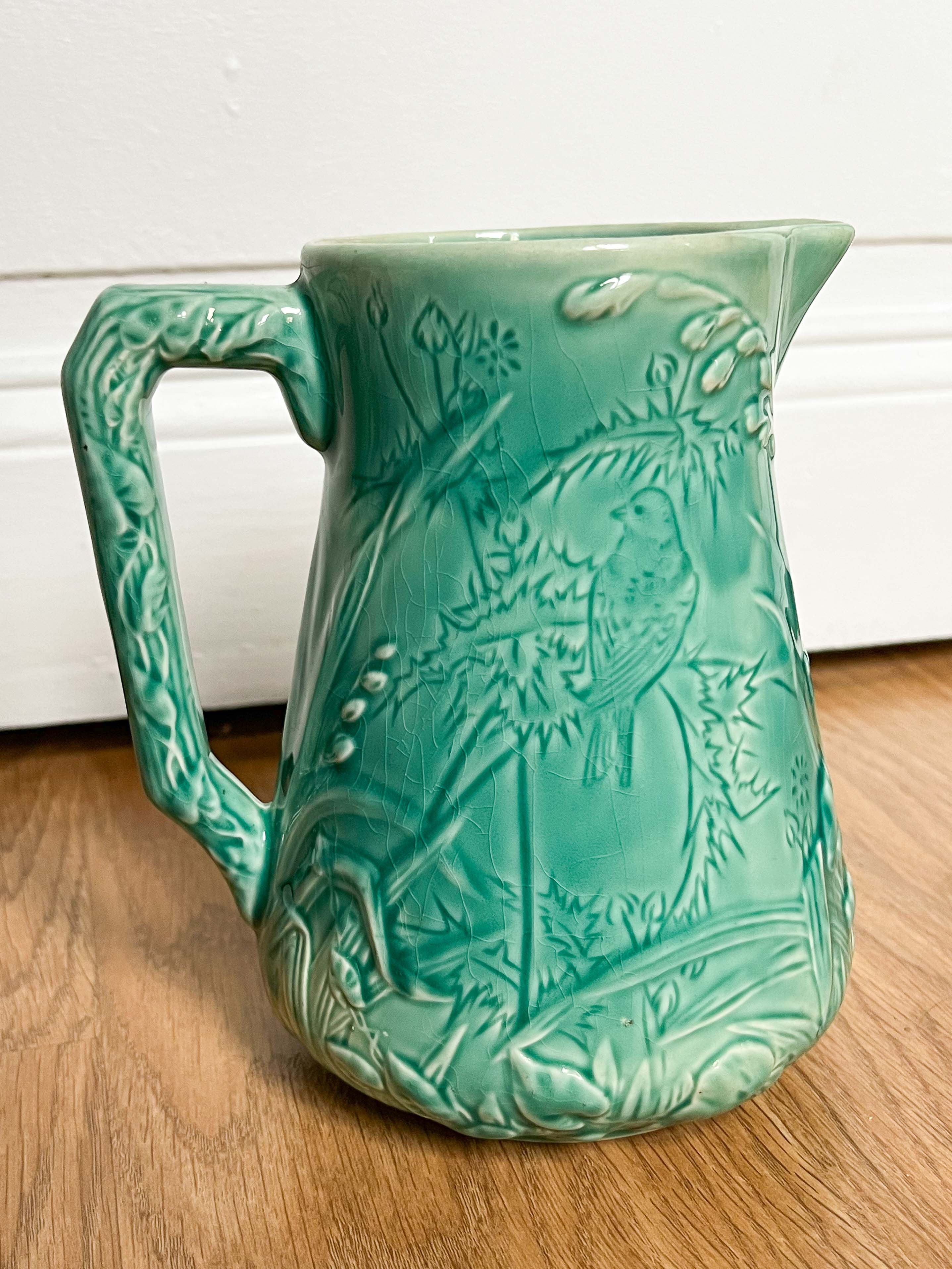 Decorative water decanter in painted ceramic