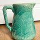 Decorative water decanter in painted ceramic