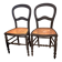 Pair of 2 chairs with cane seats in black wood, circa 1940