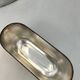 Silver-plated metal flask with leather and glass