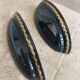 Set of two vintage wall sconces in pine green and gold.