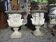 Medical vases with characters in reconstituted stone.