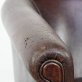 Stylish and sturdy dark brown club armchair made of sheepskin leather