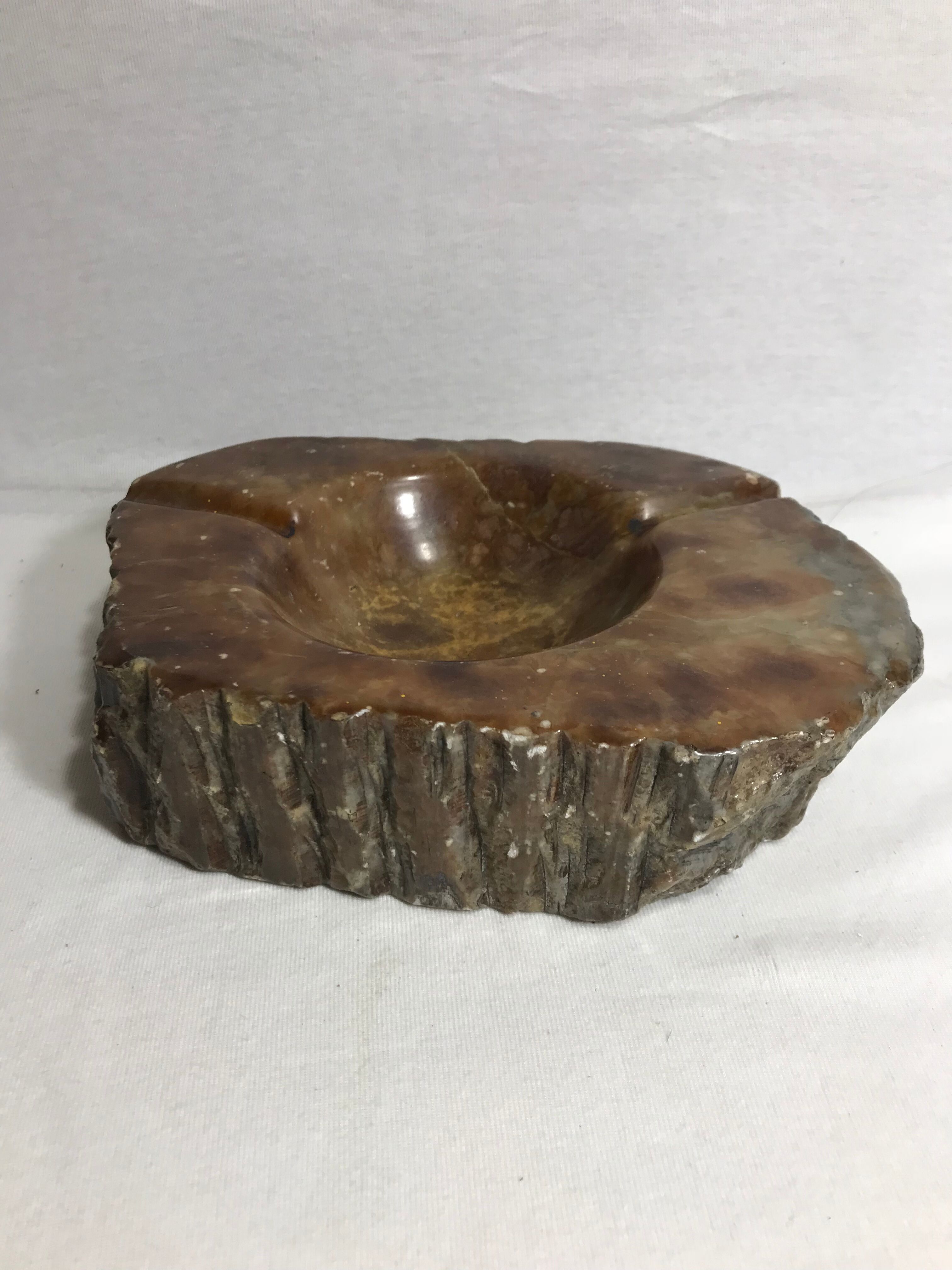 Ashtray old polished stone