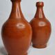 Pair of glazed terracotta jars, 26 cm