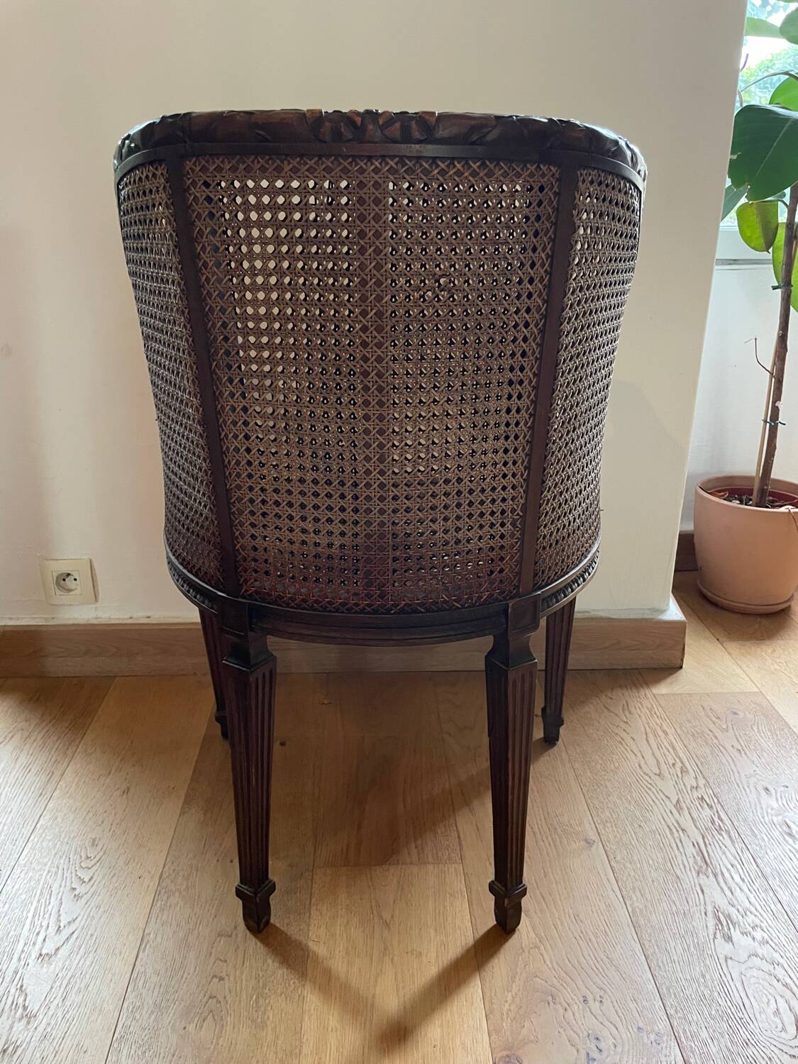 Pair of gondola armchairs in Louis XVI style with caning.