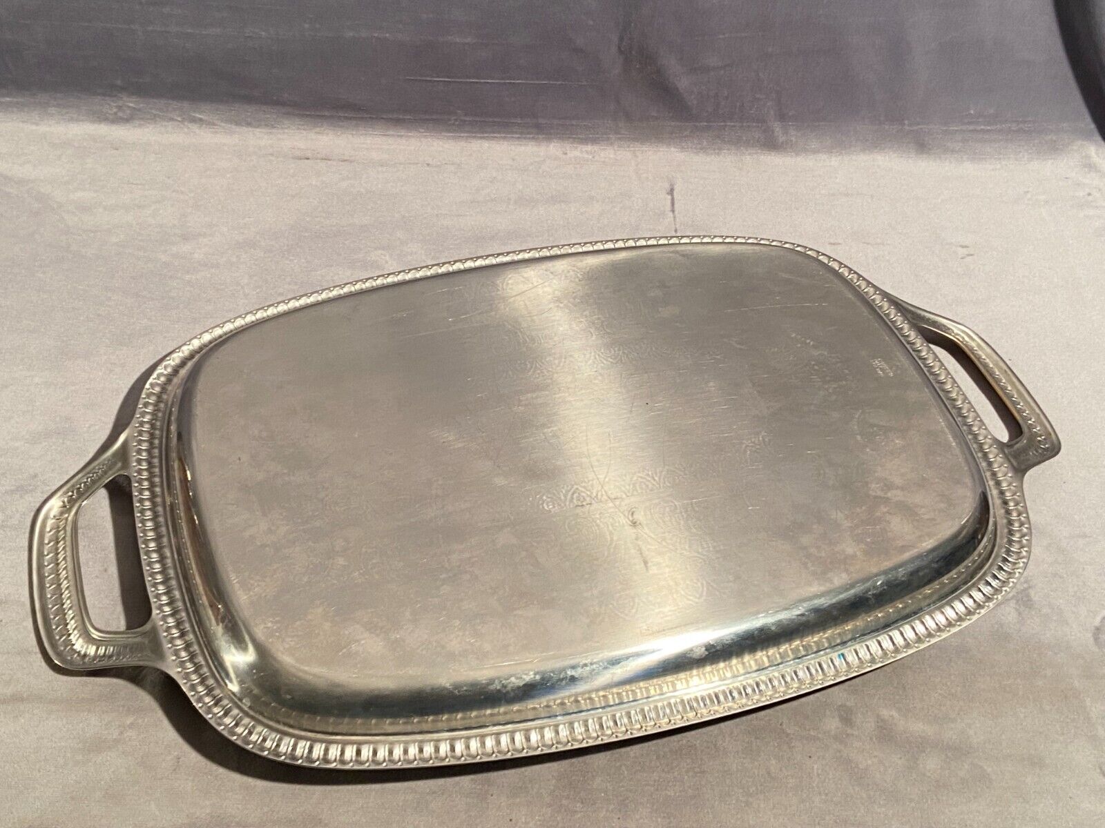 Top with stainless steel handles and gilded Regency style nets